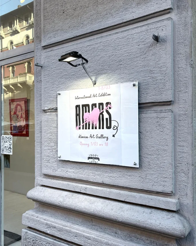 AMARS International Art Exhibition sign on the stone facade of iKonica Art Gallery in Milan