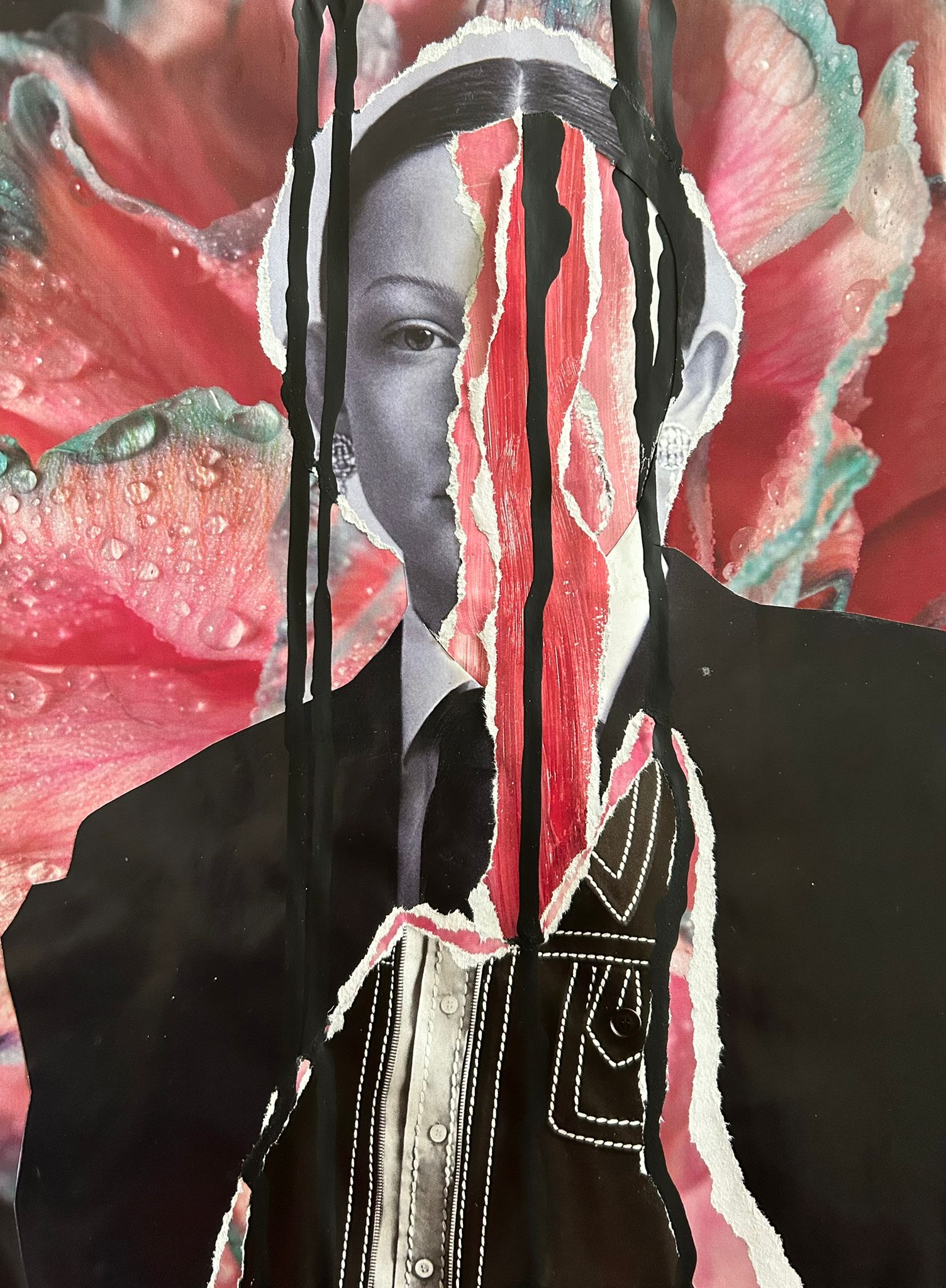 Insertion: figure in a black suit with a face sliced into vertical strips over pink flower petals